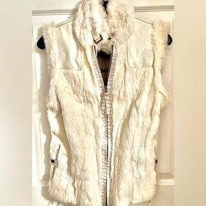 Gorgeous real leather & fur. Absolutely stunning. Barely worn
